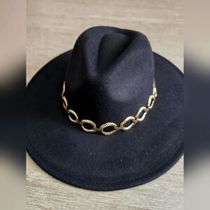 Elegant Black Hat with Gold Chain Accent